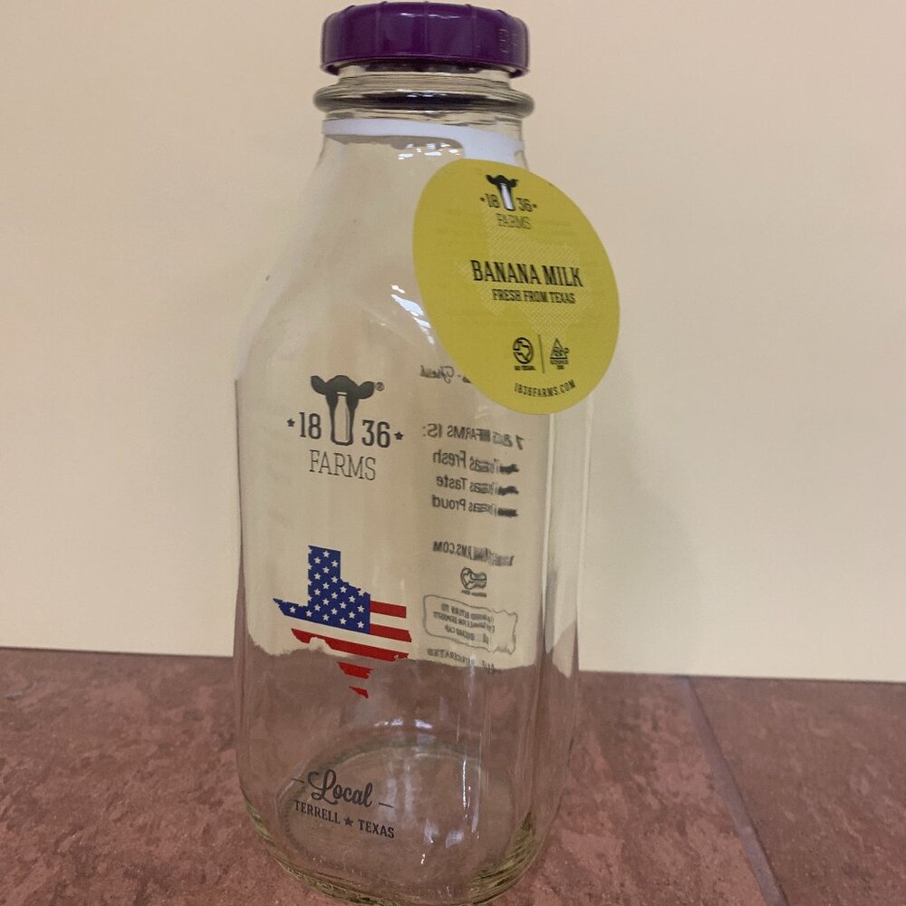BOTTLE - 32oz 1836 FARMS glass milk bottle BANANA purple cap Terrell Texas FLAG